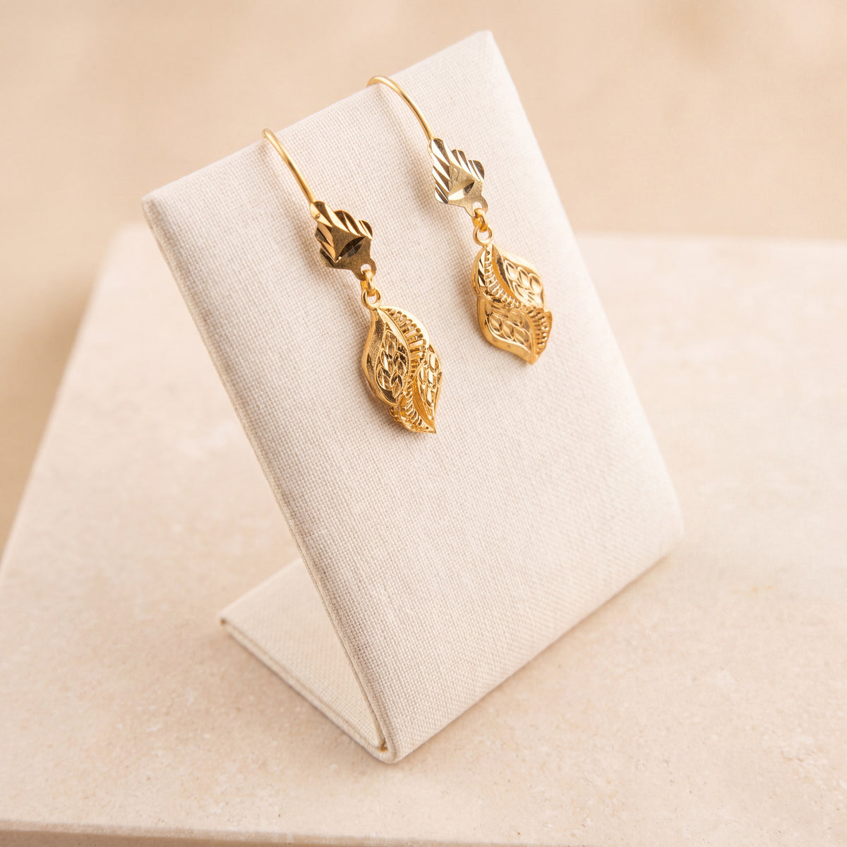 Kids Casting Earrings 36 on travertine