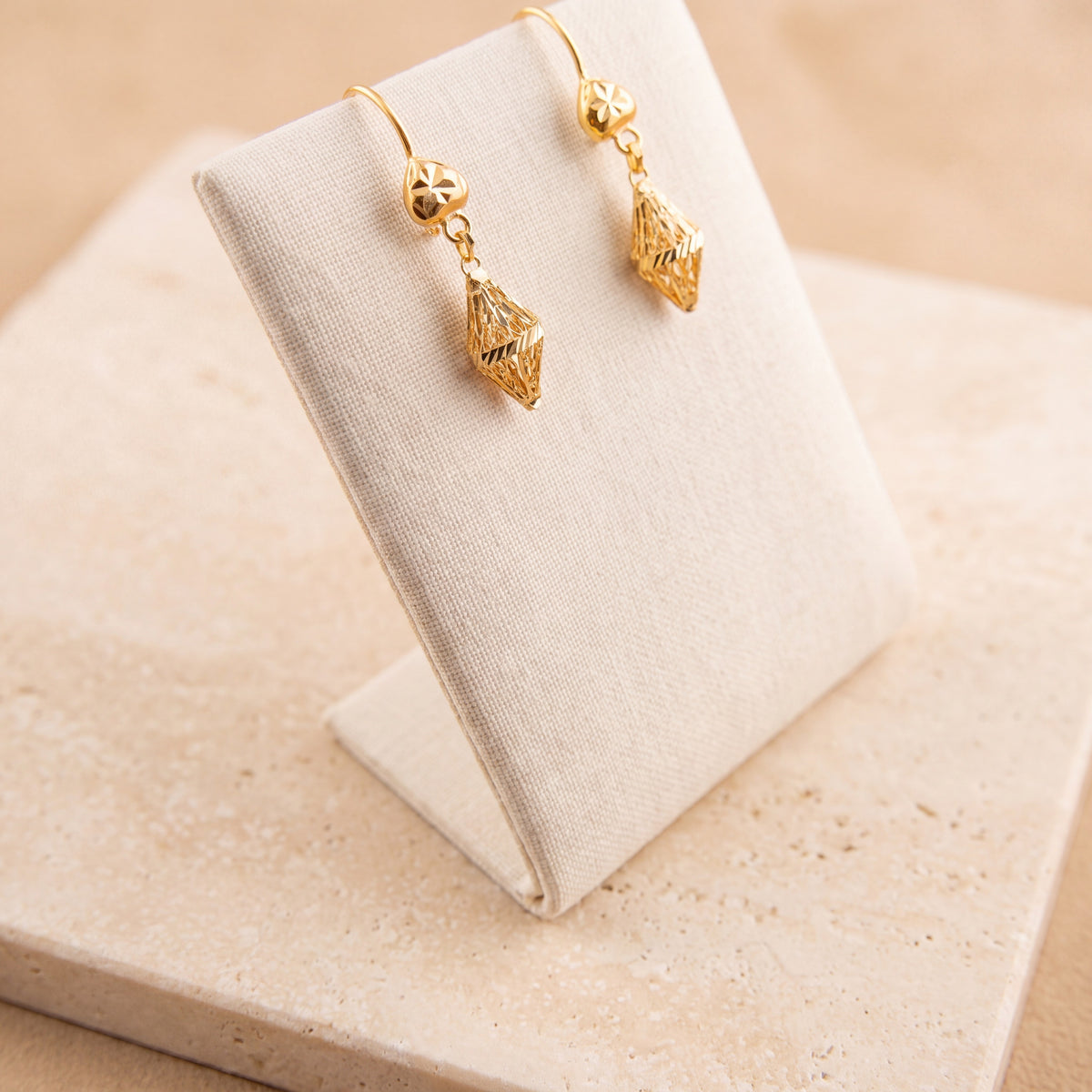 Kids Casting Earrings 37 on travertine