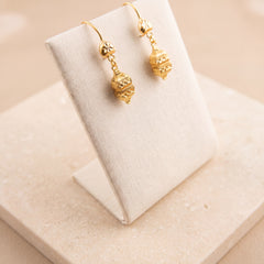 Kids Casting Earrings 38 on travertine