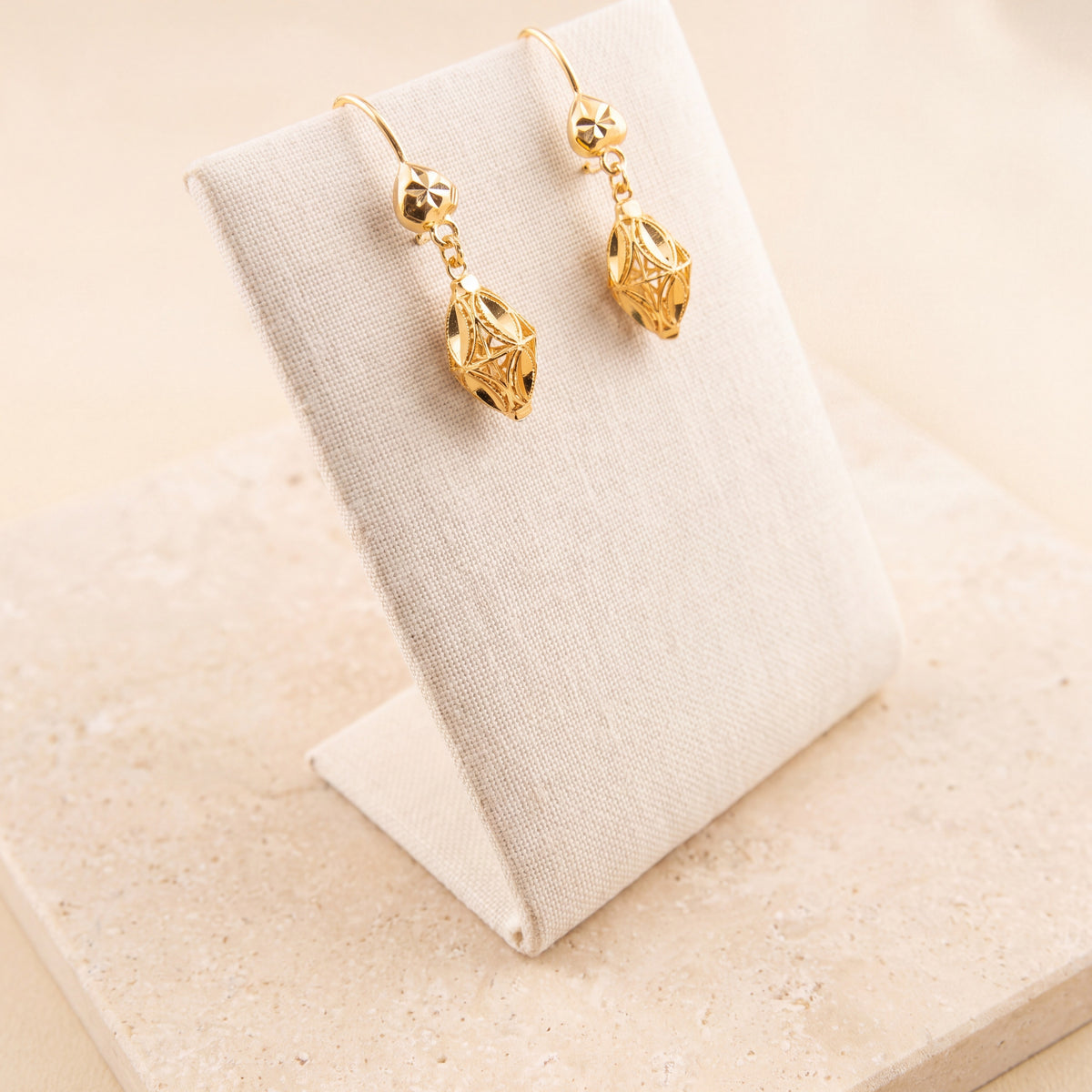 Kids Casting Earrings 39 on travertine