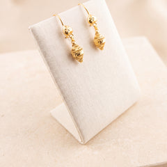 Kids Casting Earrings 40 on travertine