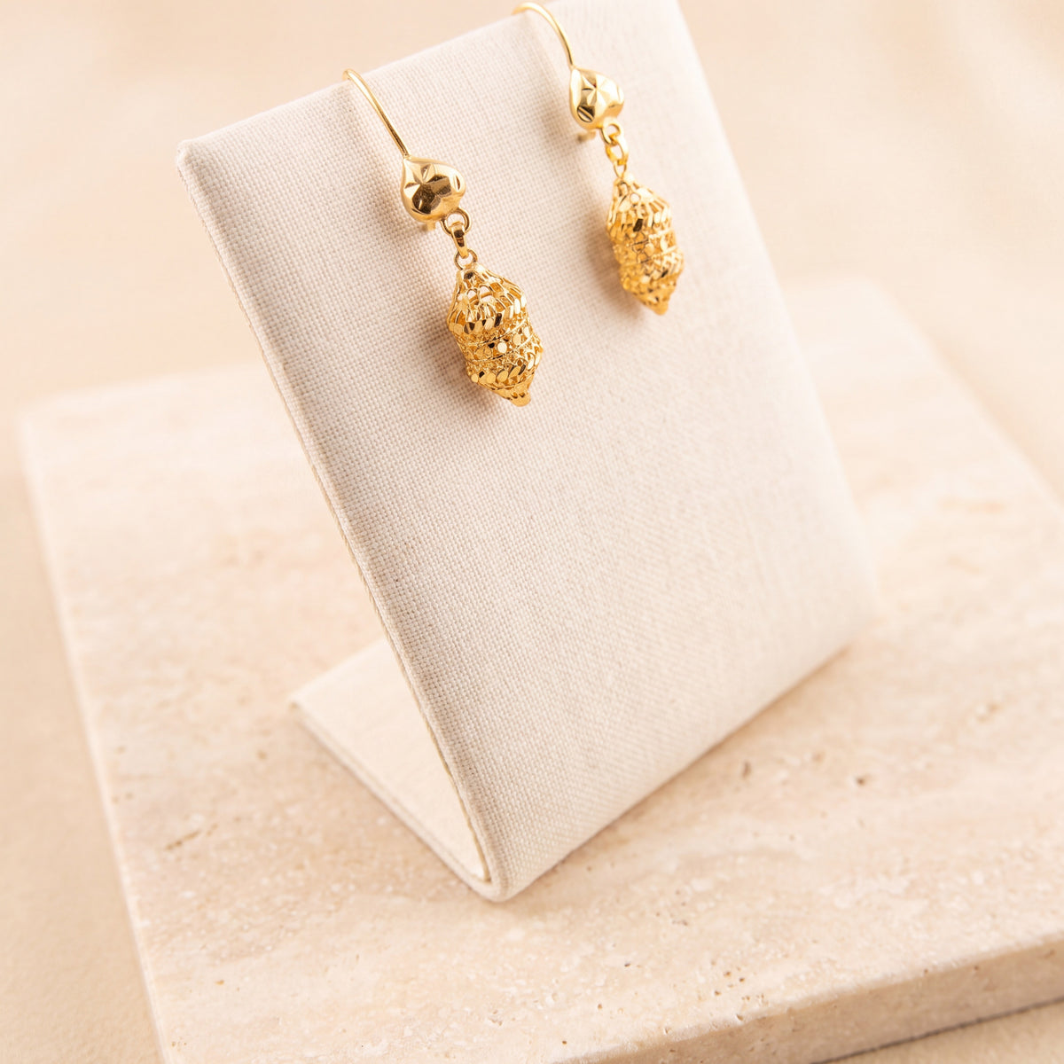 Kids Casting Earrings 43 on travertine