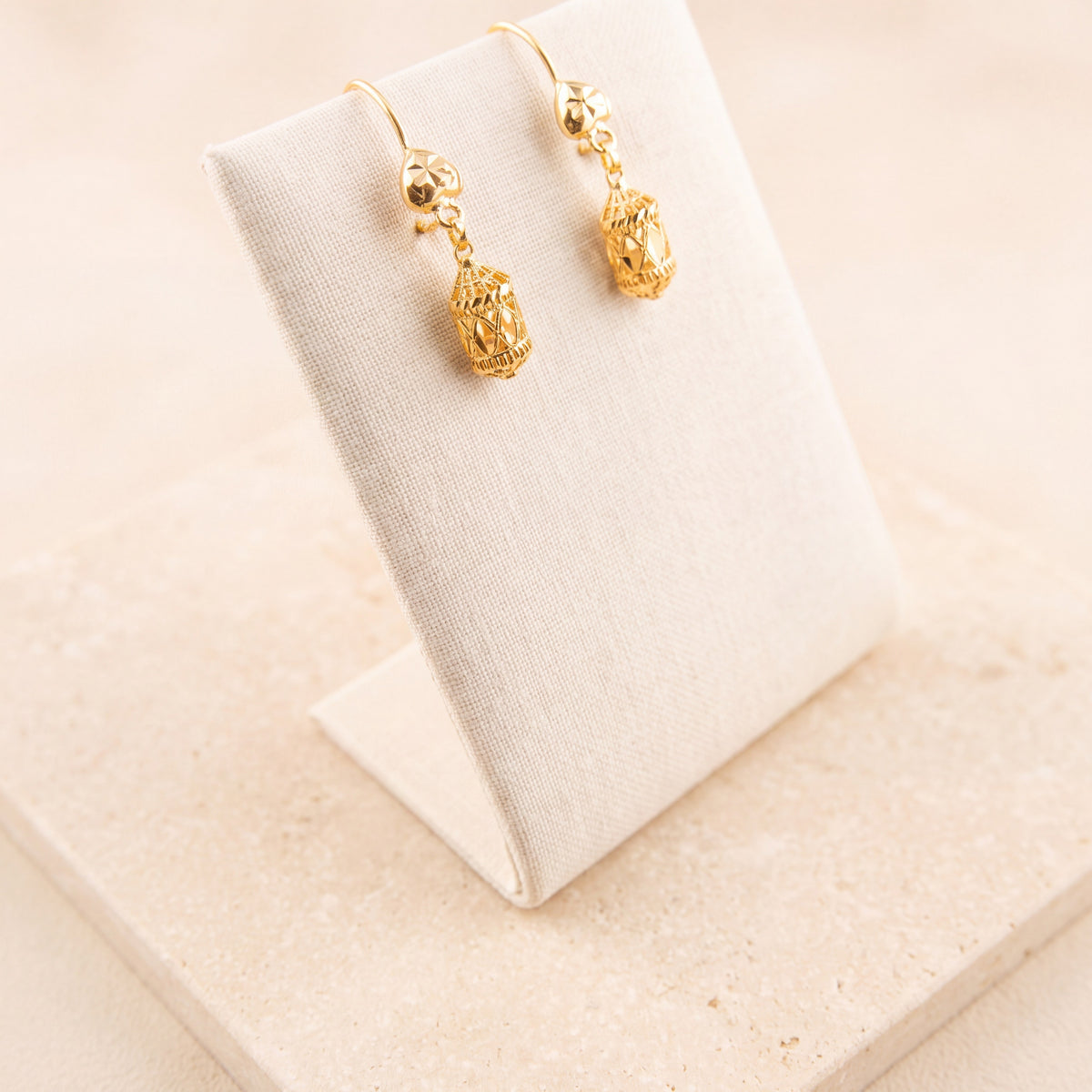 Kids Casting Earrings 44 on travertine