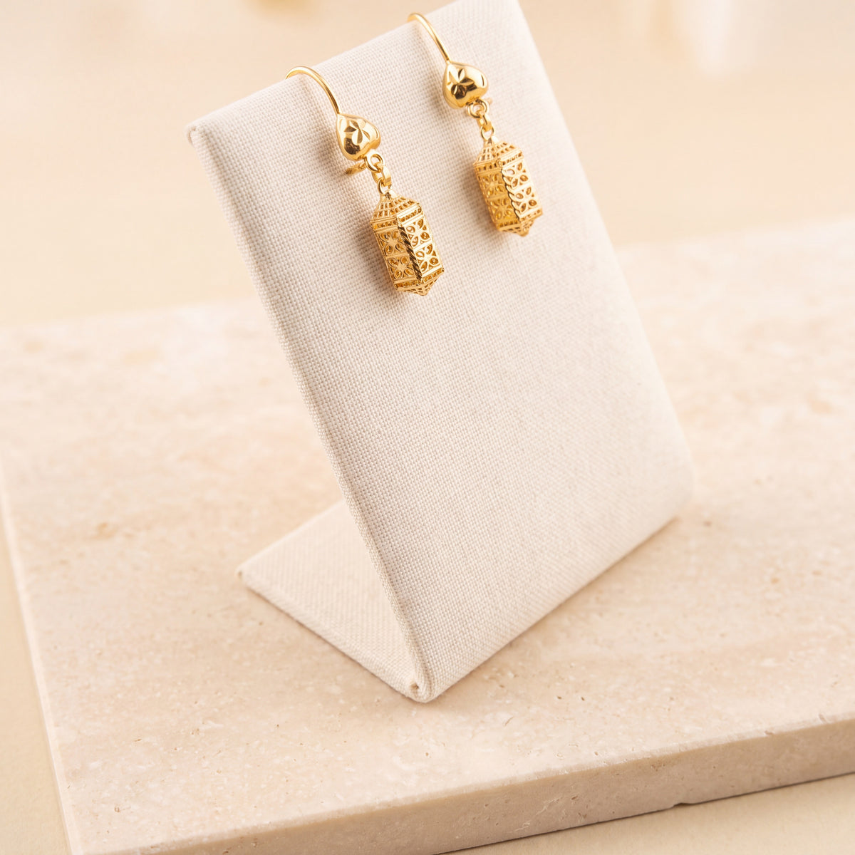 Kids Casting Earrings 45 on travertine