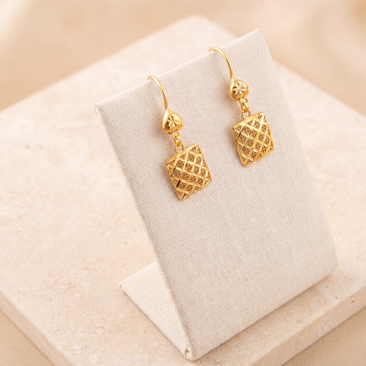Kids Casting Earrings 47 on travertine