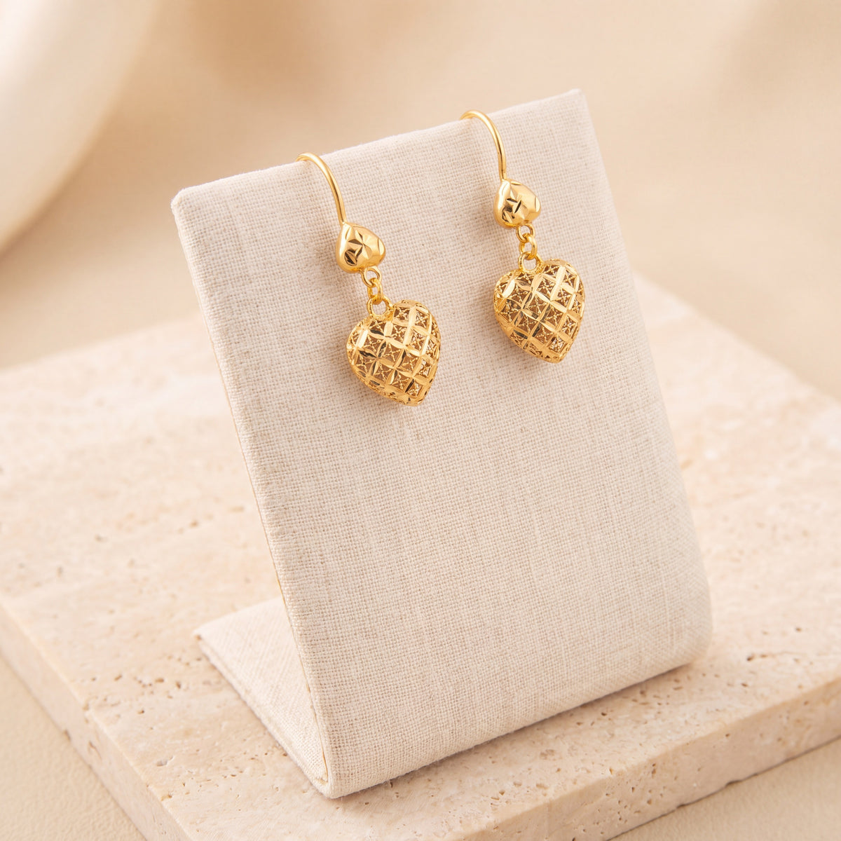 Kids Casting Earrings 48 on travertine