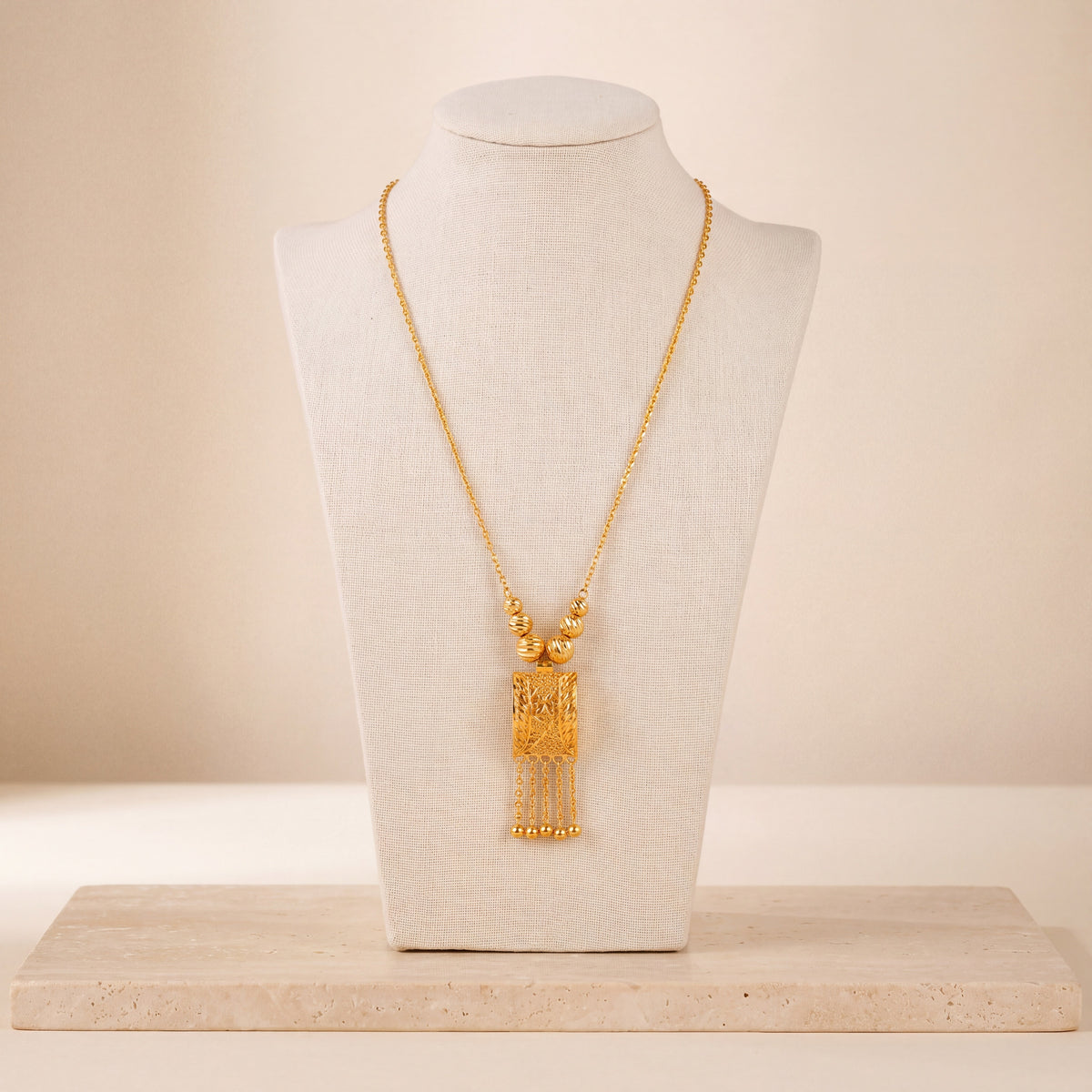 Kids Casting Mala Necklace 4 on travertine