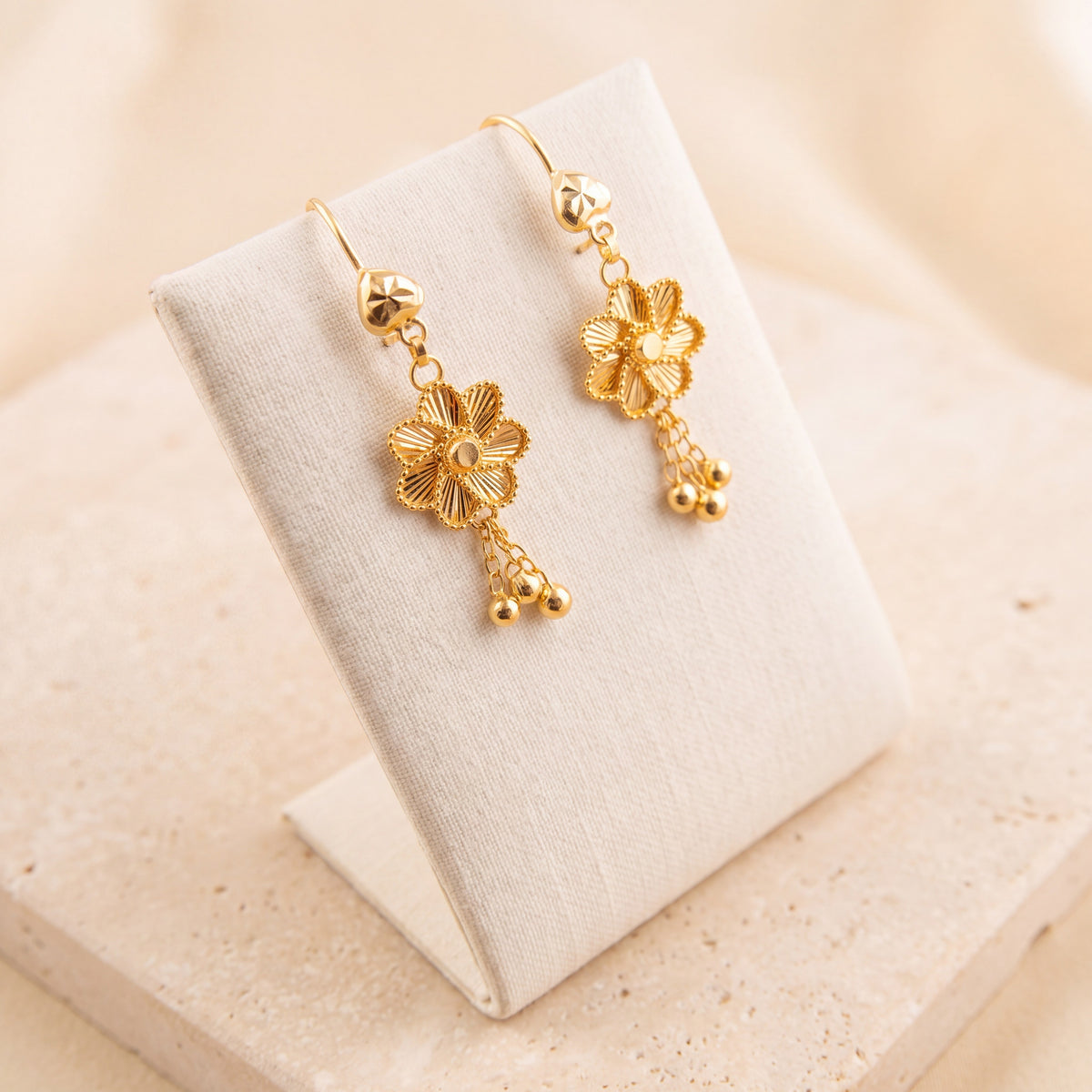 Kids Flower Earrings 5 on travertine