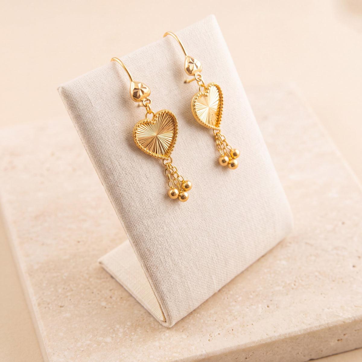 Kids Heart Earrings 4 on travertine