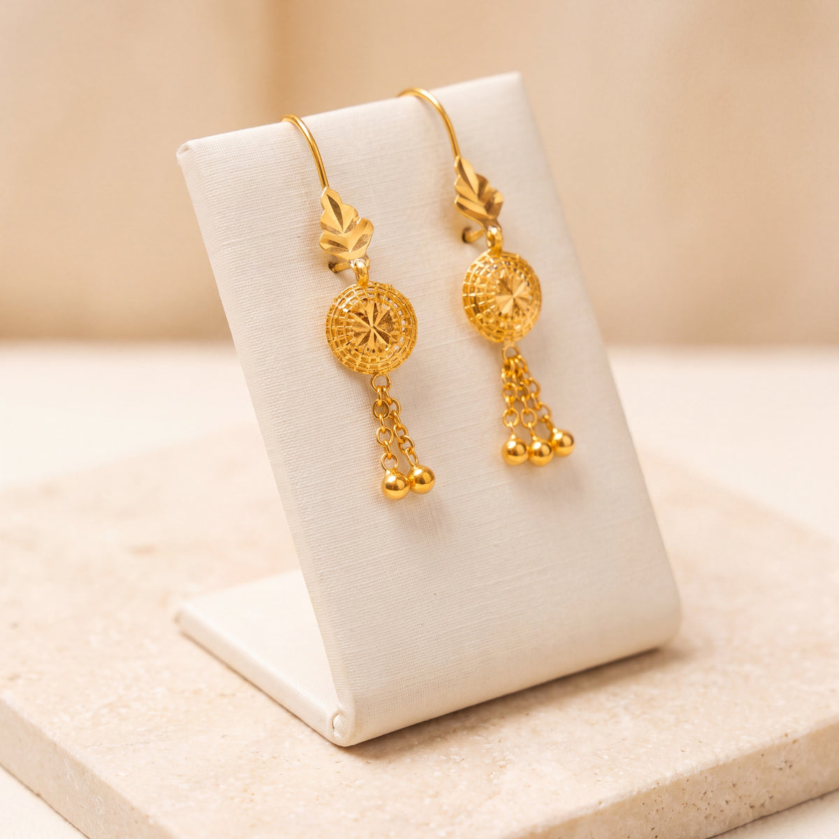 Kids RP Earrings 2 – Leaf top, on travertine