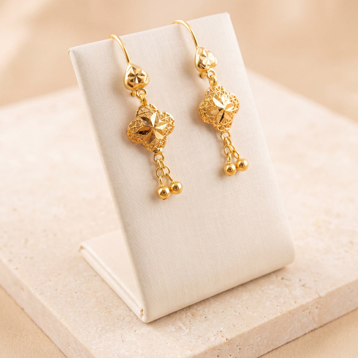 Kids RP Earrings 34 on travertine