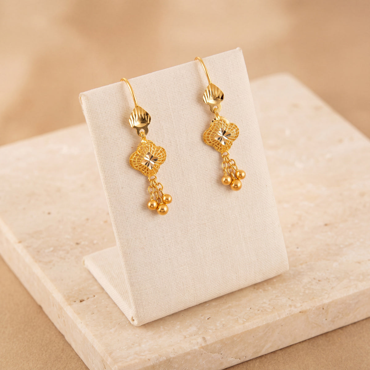 Kids RP Earrings 5 on travertine