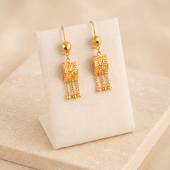 Kids Square Earrings 2 on travertine