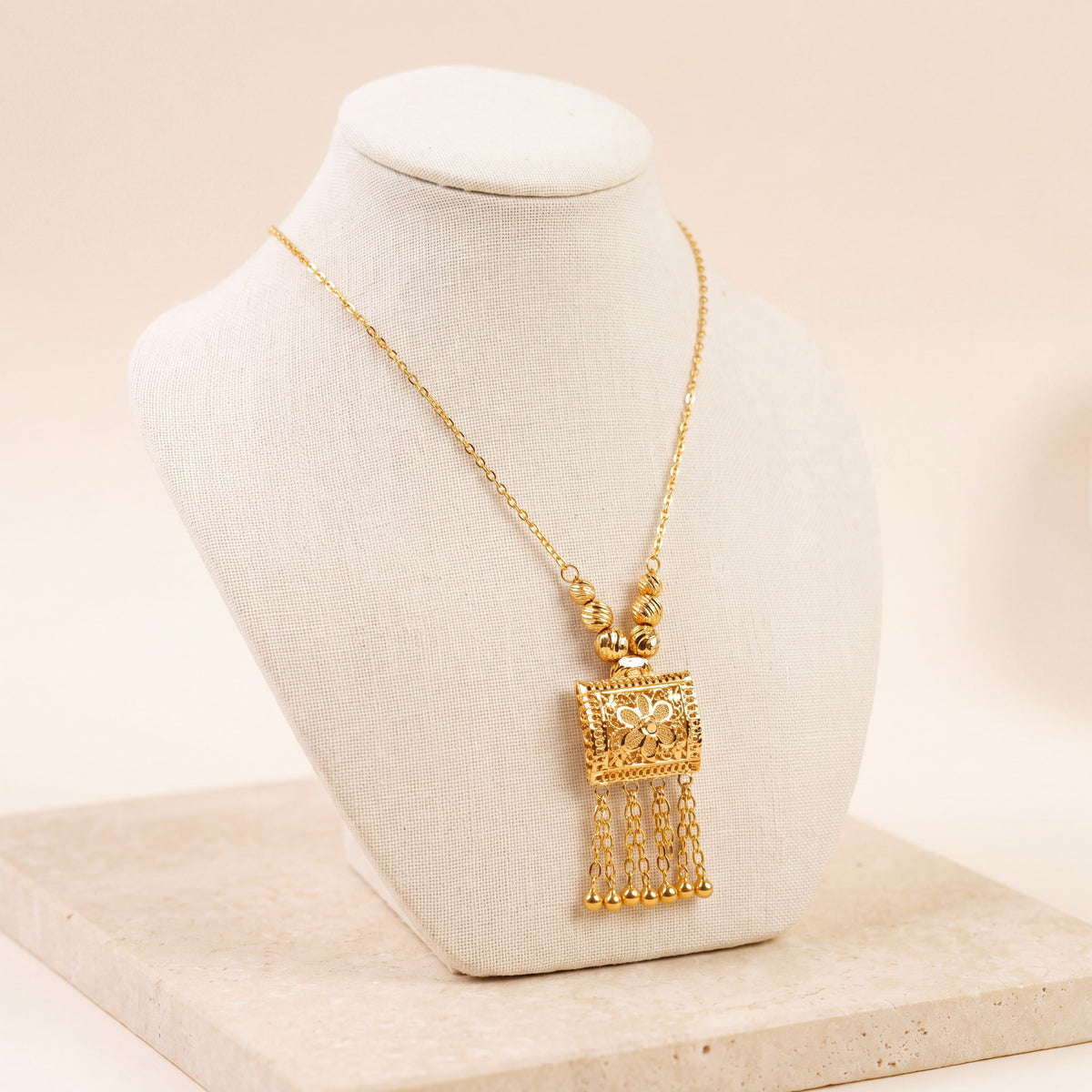 Kids Square Mala Necklace 1 on travertine