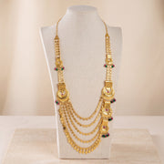 Layered Moon Moria Necklace 1 on travertine