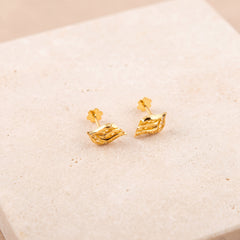 Leaf Stud Earrings 2 on travertine