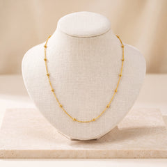 Link with Ball Chain 2 on travertine