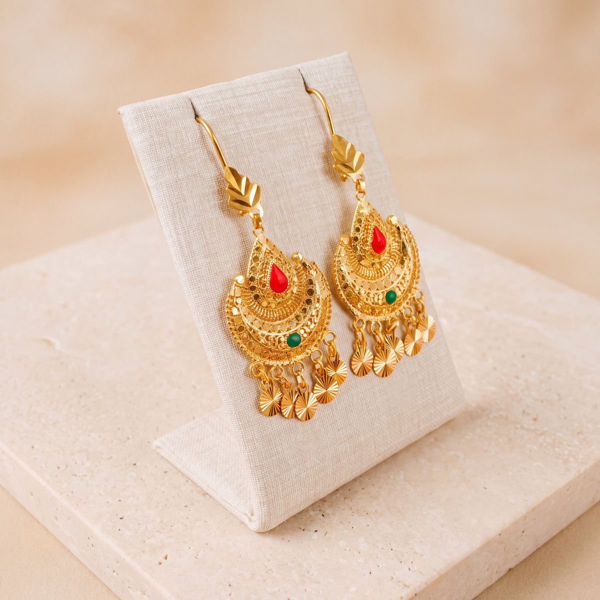 Moon Earrings with Mina 1 – Red and green stones, on travertine
