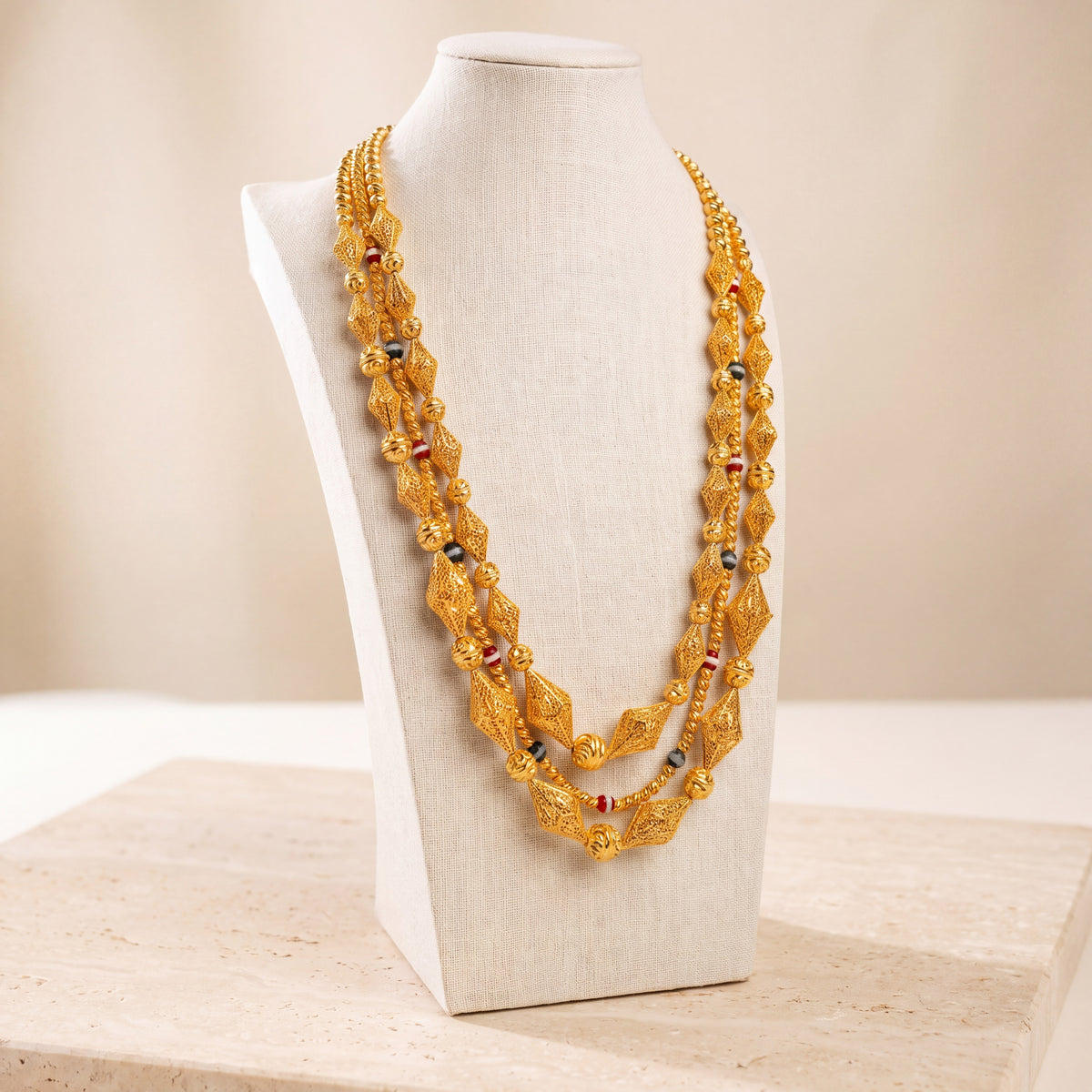 Multi Line Mala Necklace 4 on travertine