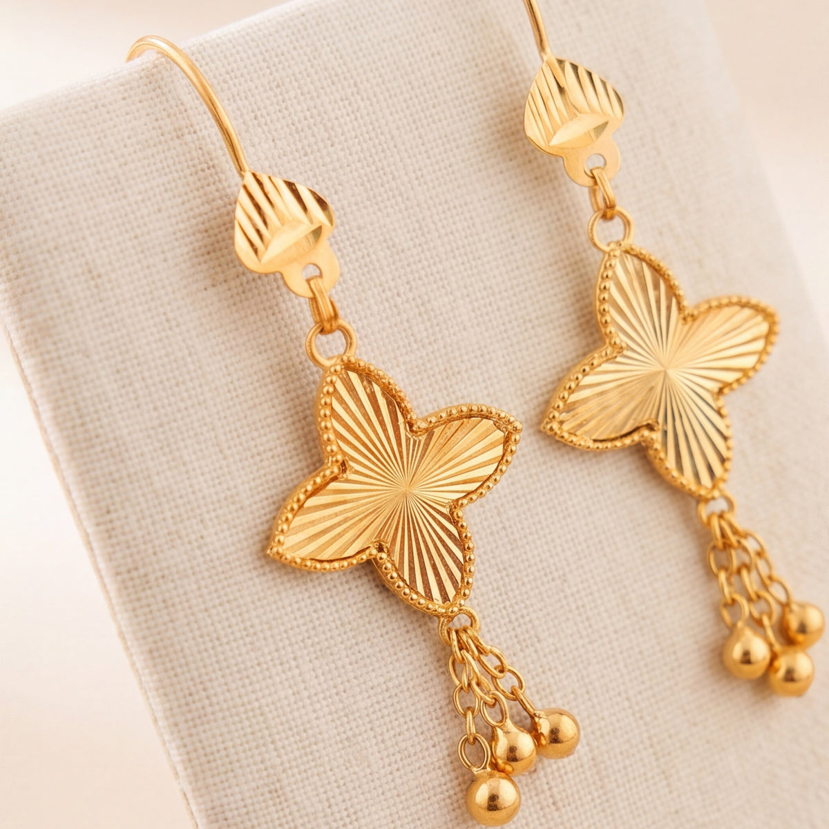 Petal Flower Earrings 3 – Gold clover with dangles, design detail