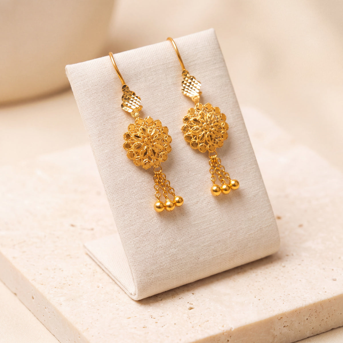RP Earrings 1 – 3 ball dangles, on travertine