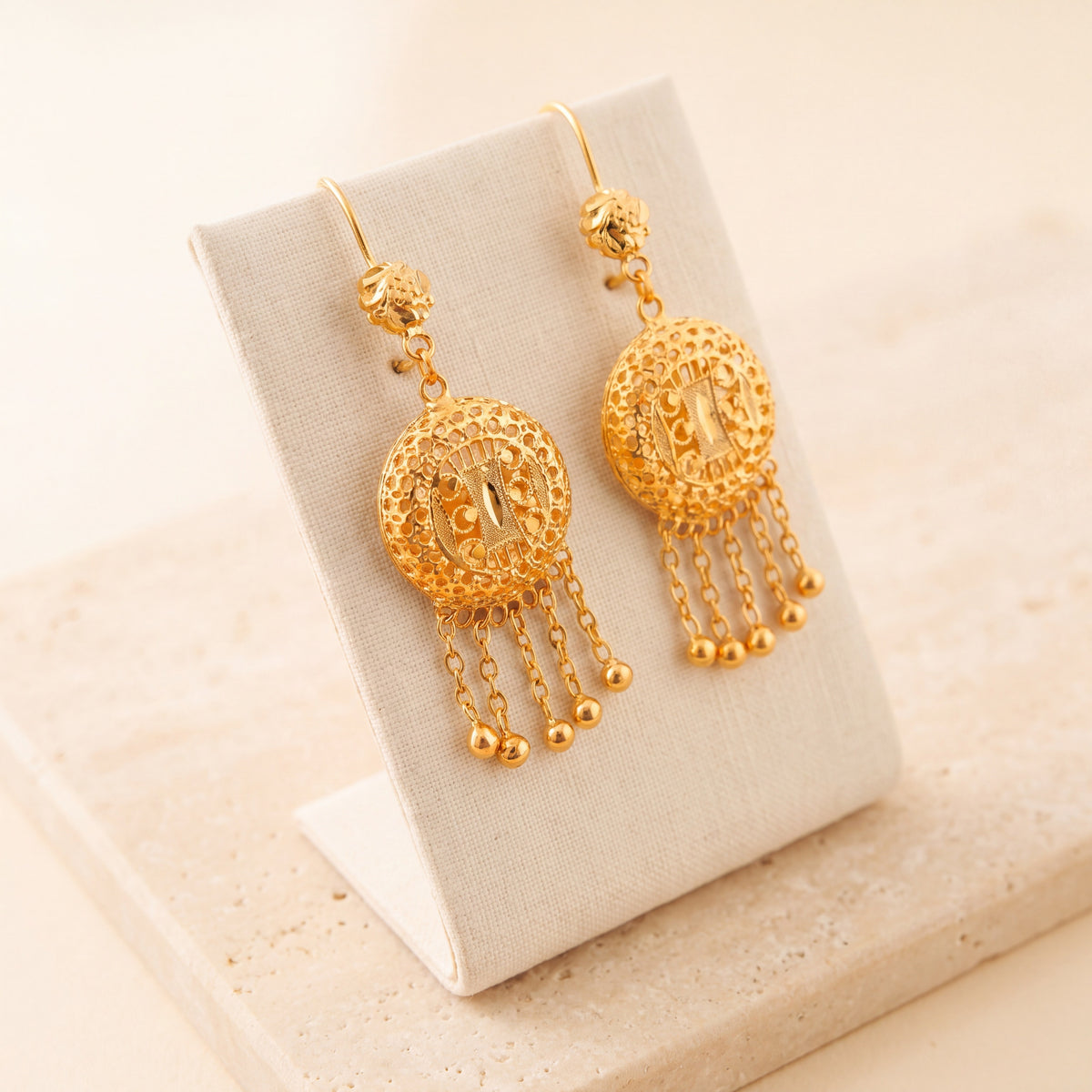 RP Earrings 15 on travertine