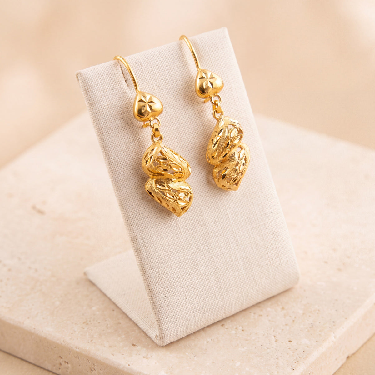 RP Earrings 16 on travertine