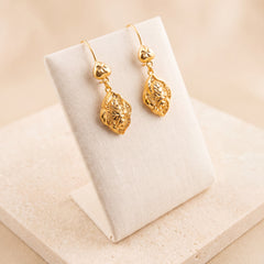 RP Earrings 19 on travertine
