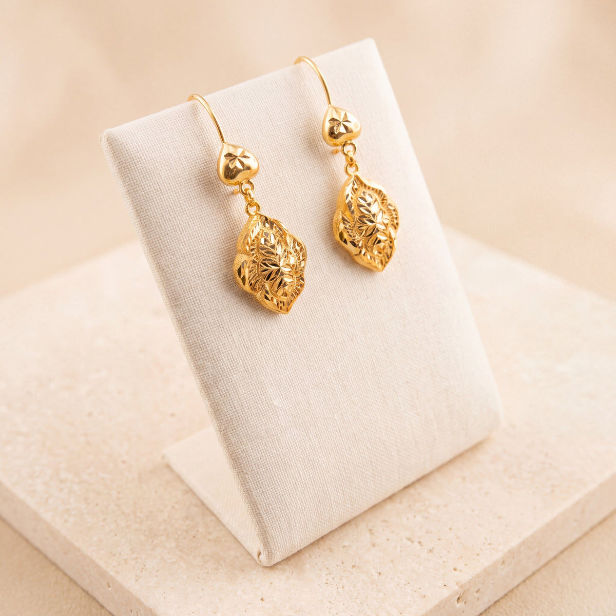 RP Earrings 19 on travertine