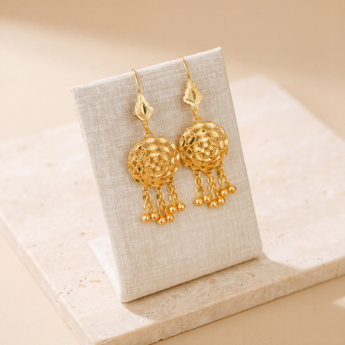 RP Earrings 2 on travertine