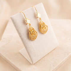 RP Earrings 21 on travertine