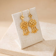 RP Earrings 4 – Diamond top, on travertine
