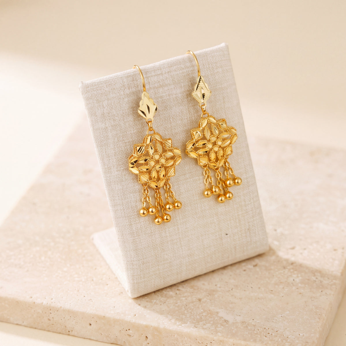 RP Earrings 6 on travertine