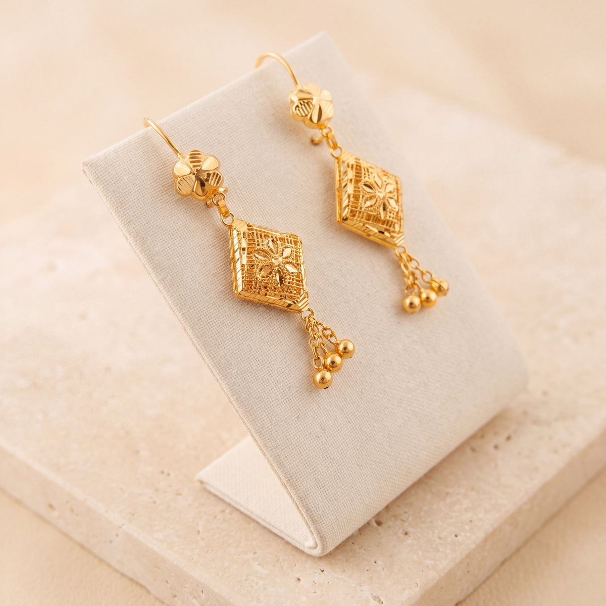 RP Earrings 7 on travertine