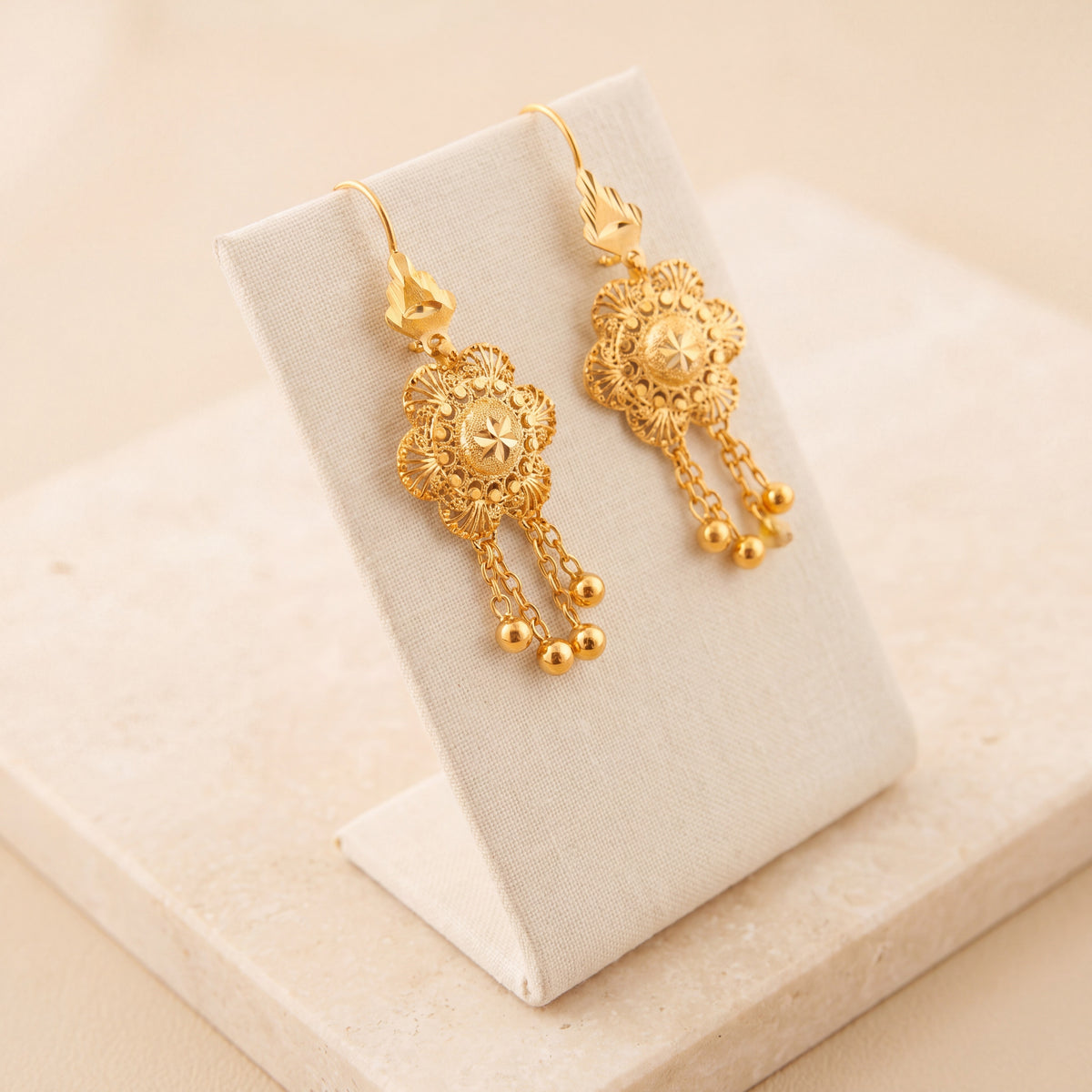 RP Earrings 8 on travertine