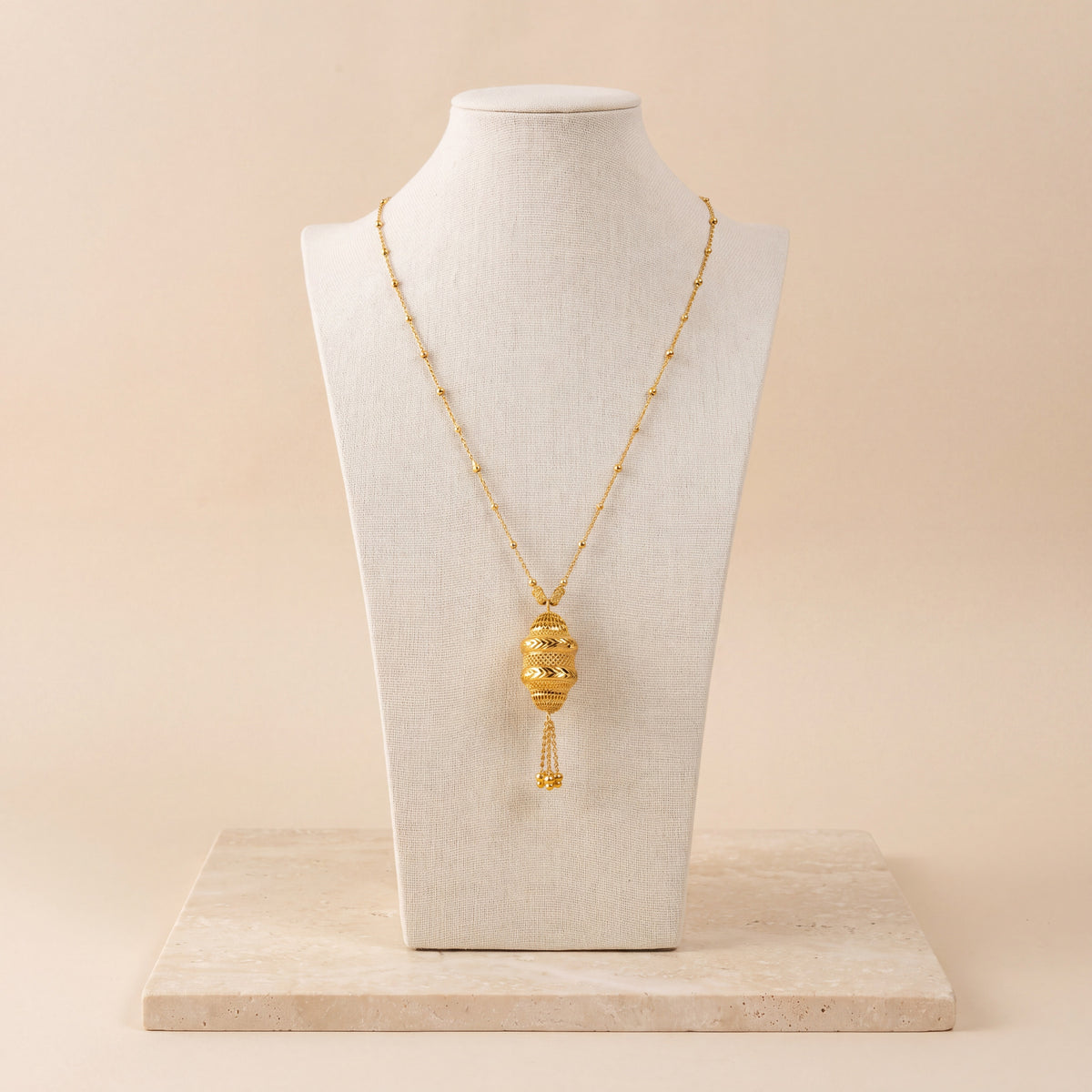 RP Mala Necklace 1 on travertine
