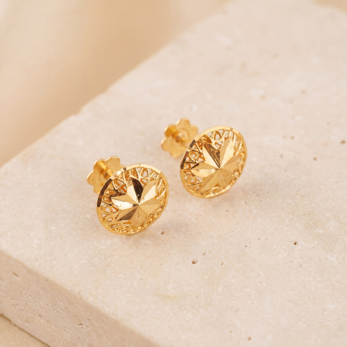 Sphere Stud Earrings 2 on travertine