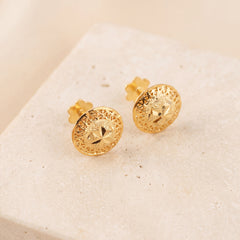 Sphere Stud Earrings 3 on travertine