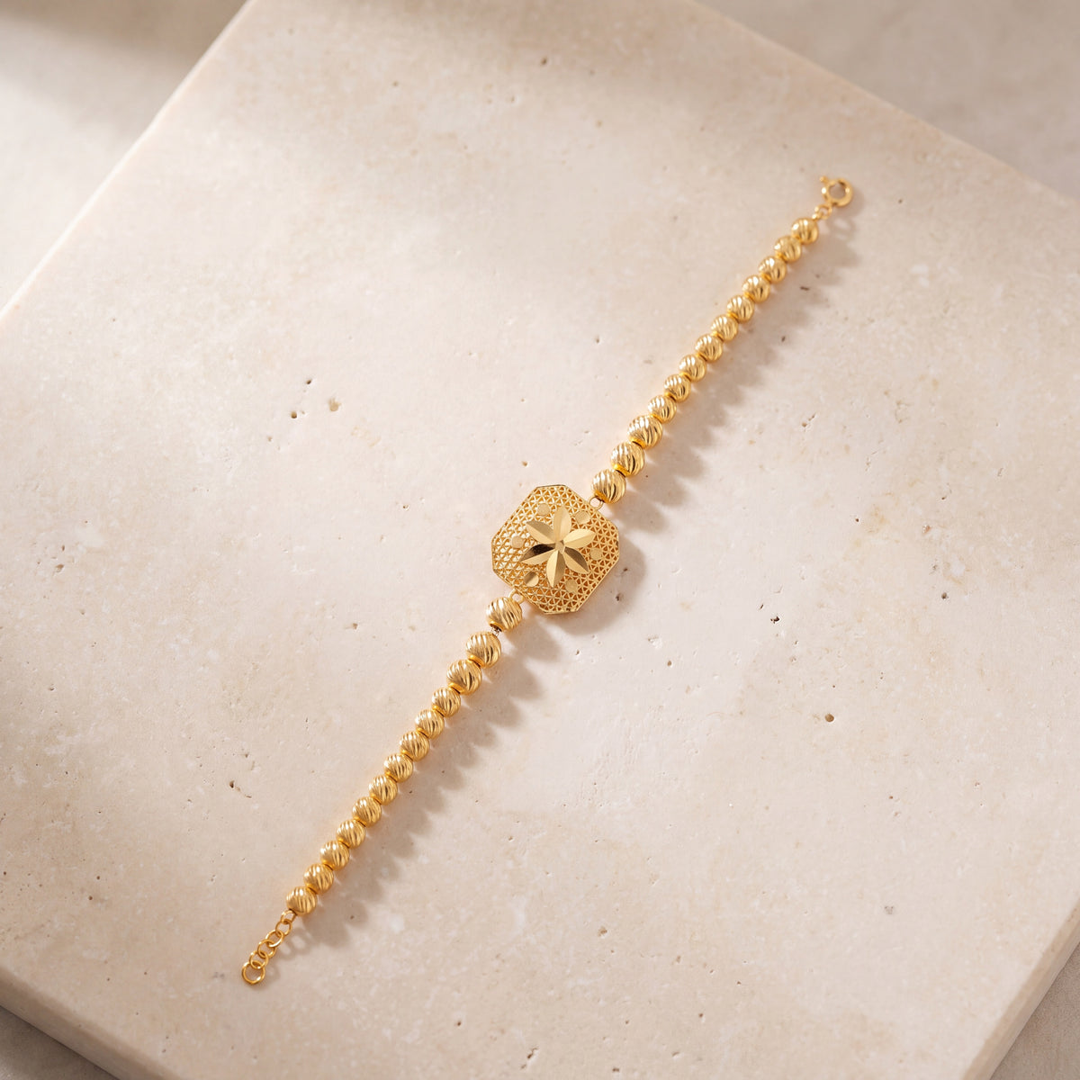 Frame Bracelet with Beads (D1) on travertine