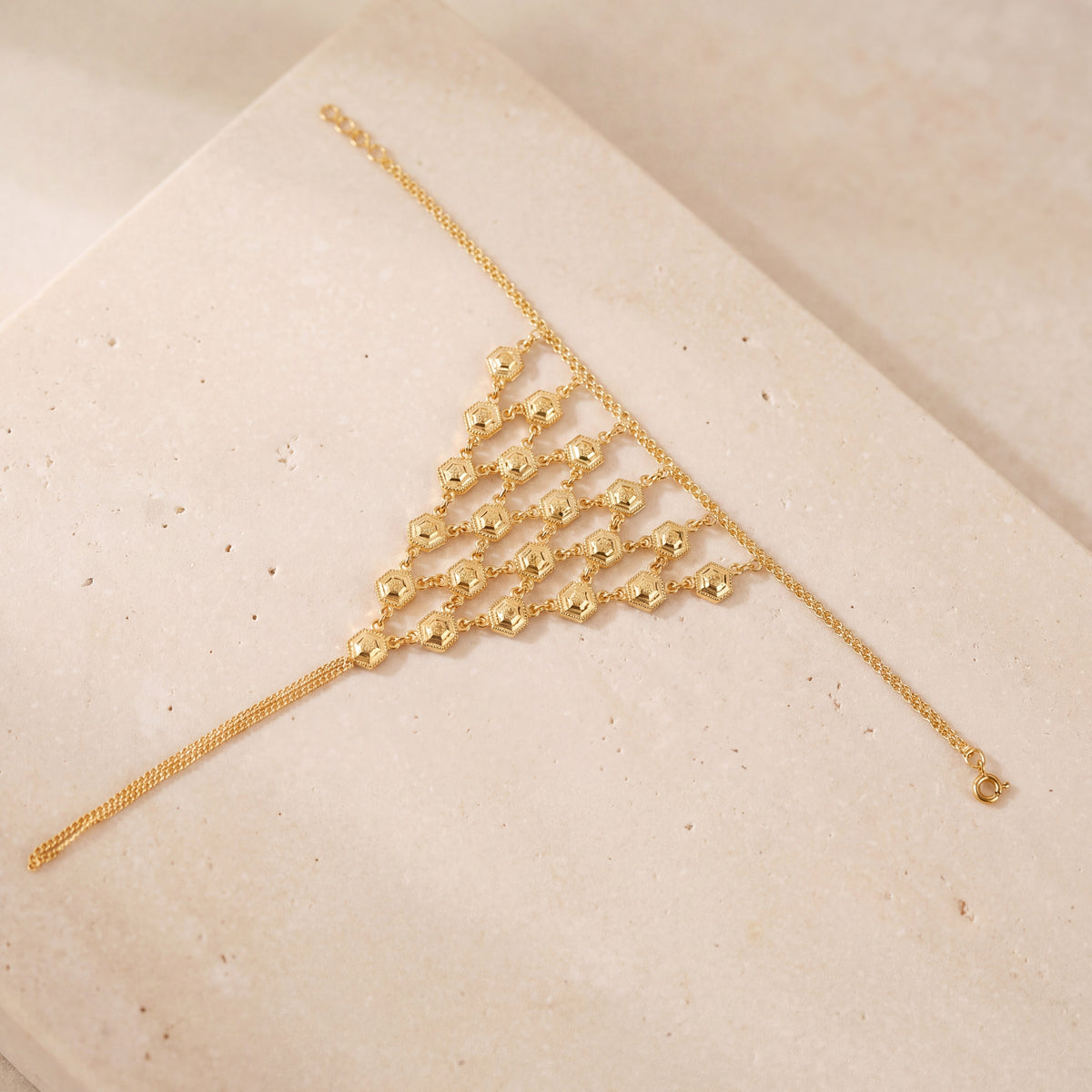 Hand Chain Bracelets (D3) on travertine