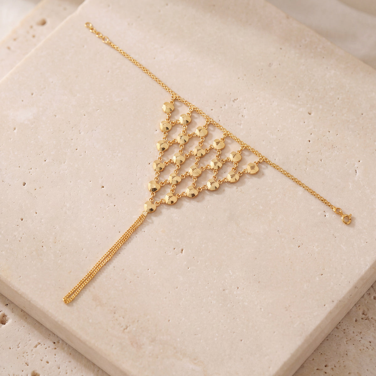 Hand Chain Bracelets (D5) on travertine