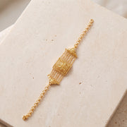 Kid's Murabba & Chain Bracelet on travertine