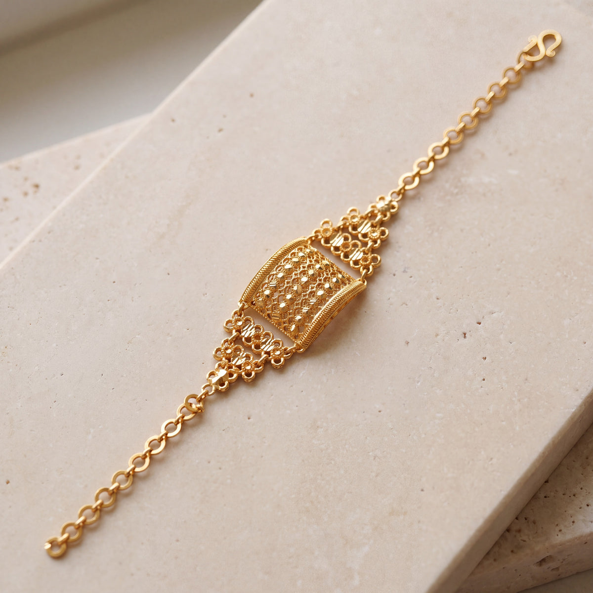 Kid's Square Bracelet (D1) on travertine