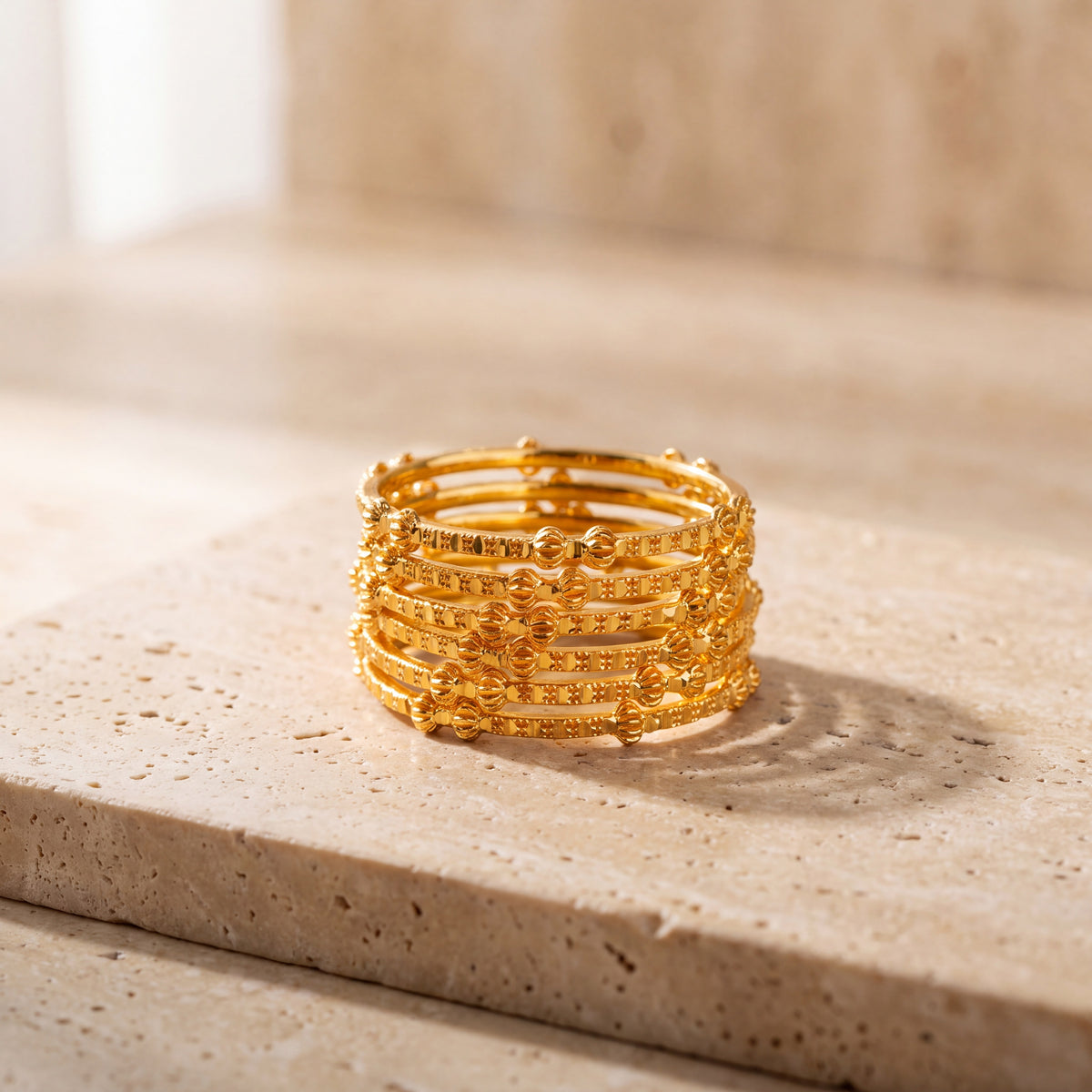 Kid's Bangles (D10-A) on travertine