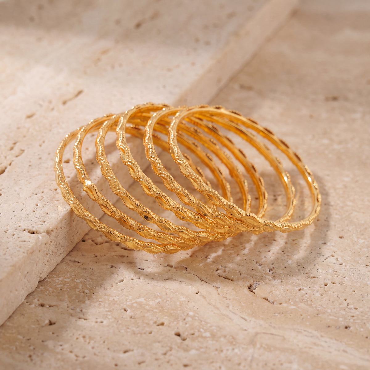 Kid's Bangles (D12-M) on travertine