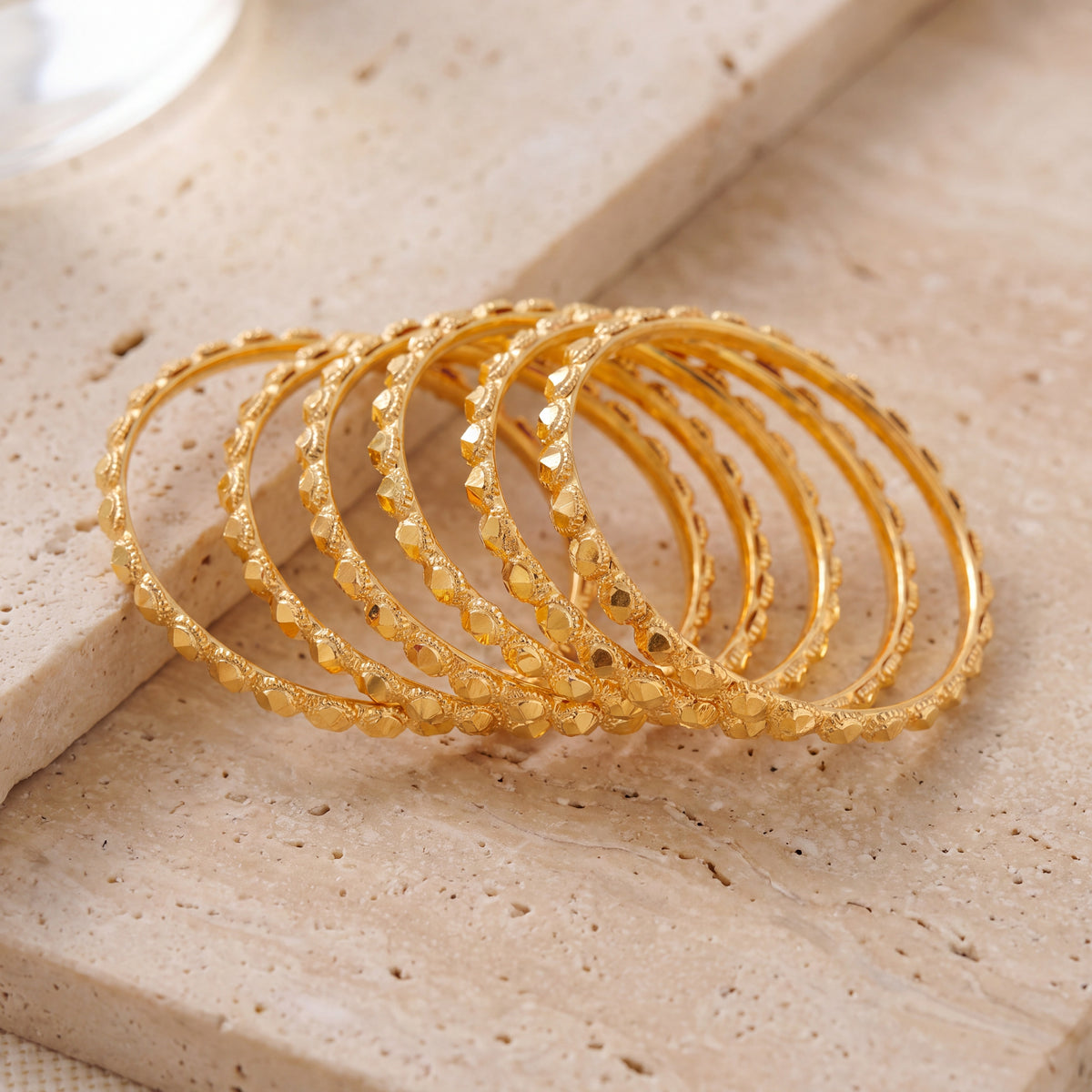 Kid's Bangles (D13-M) on travertine