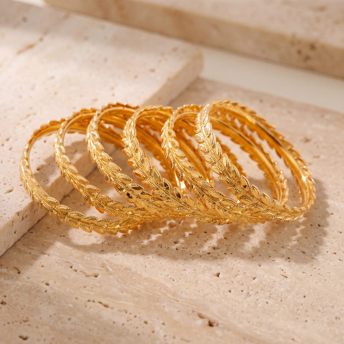 Kid's Bangles (D14-M) on travertine