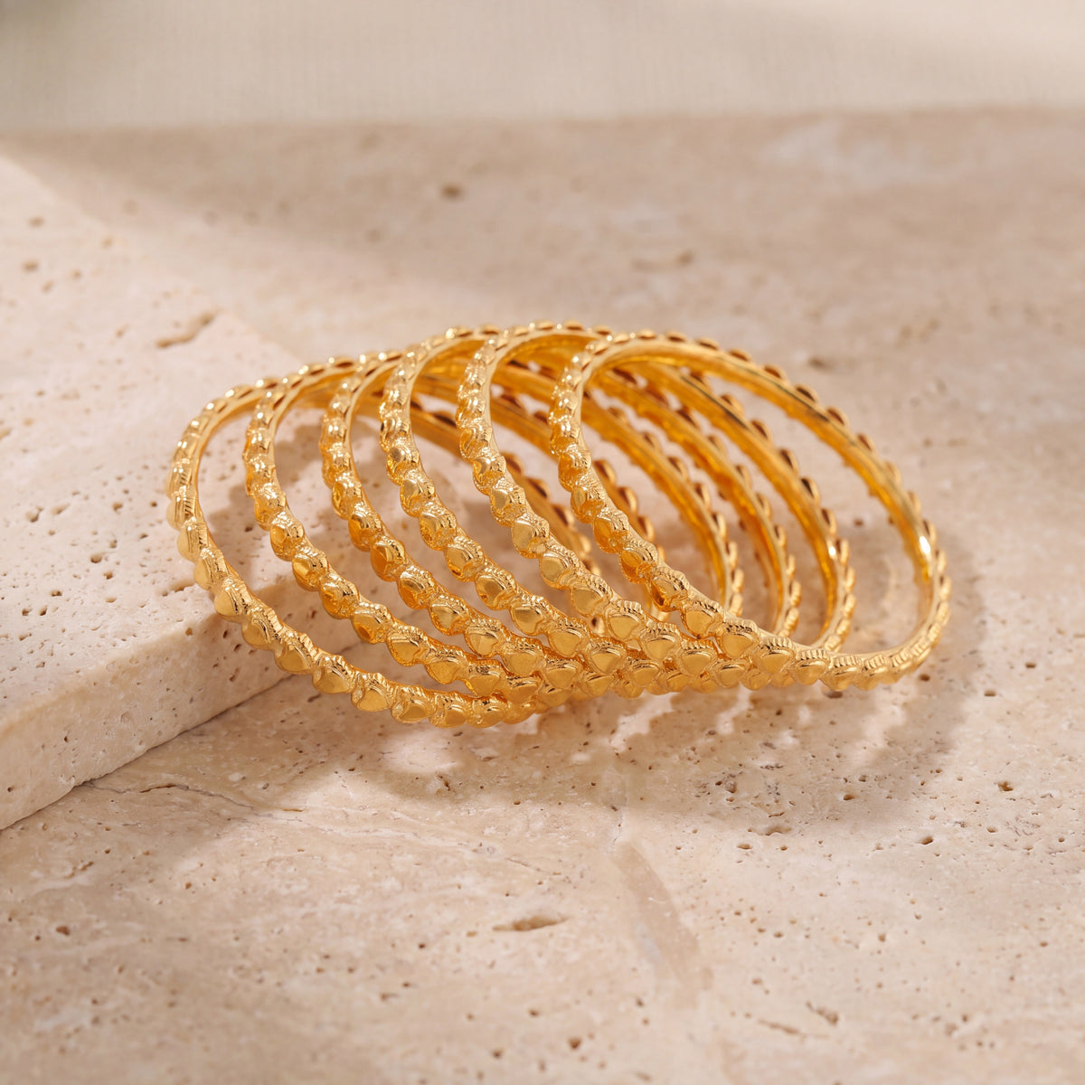 Kid's Bangles (D15-M) on travertine