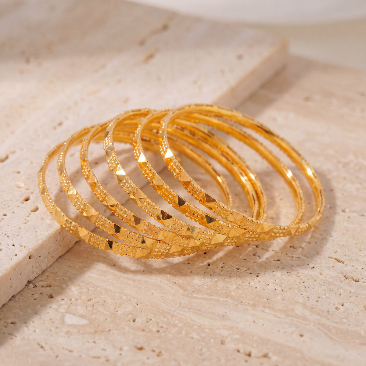 Kid's Bangles (D16-N) on travertine