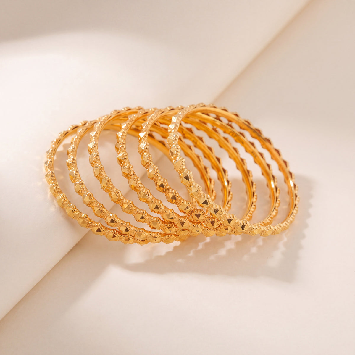 Kid's Bangles (D17-N) in 925 silver with 24K gold plating, studio photo